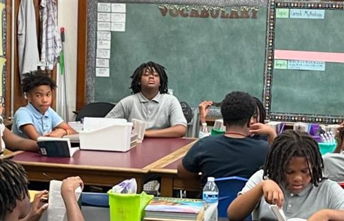 students reading a book