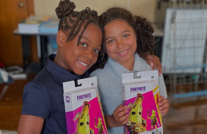  2 girls posing together on the 1st day of school