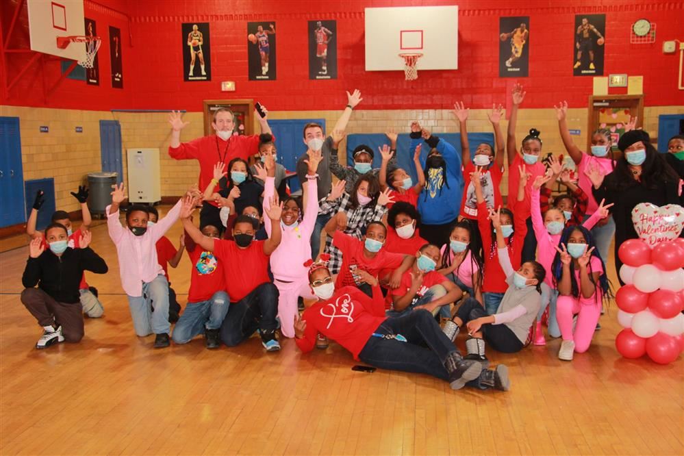  students and staff dancing