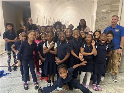  Children posing for a photo at the DIA