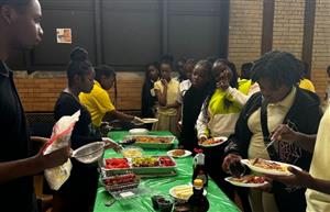 Students at a waffle bar.