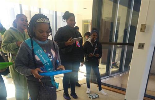 students controlling robot cars