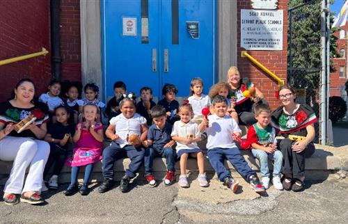 pre-school posing with teachers