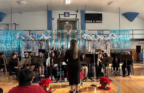 students waiting to start performing