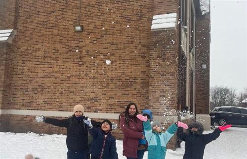  Students playing outside in the snow