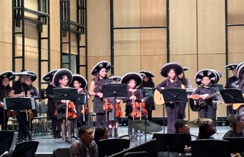  Students performing at a concert