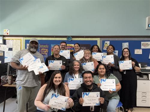  CLT staff posing with thier certificates