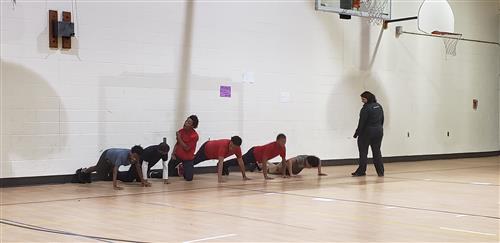 Boys doing push-ups 
