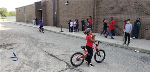 student riding bike 2 