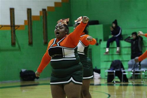 Ben Carson High School cheerleader at basketball game 