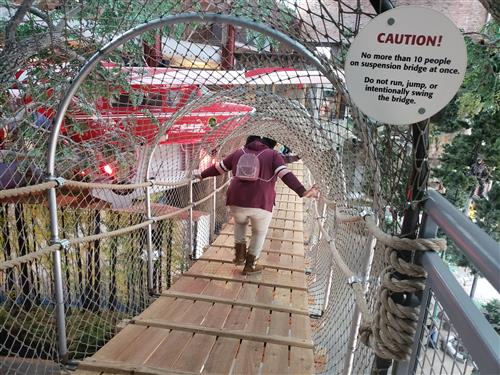 walking across a bridge  