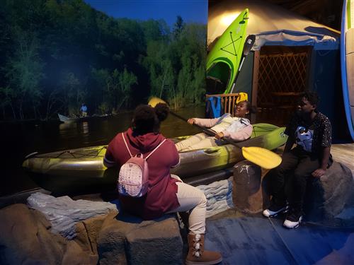 paddling a canoe   