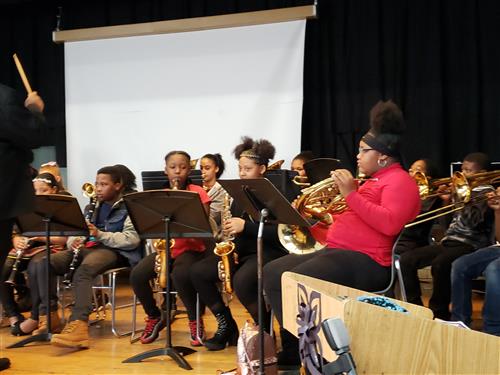 band members playing wind instruments  