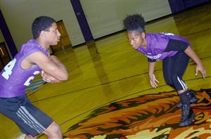 Azia Isaac practicing with student 