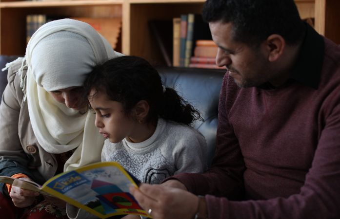  Family reading together