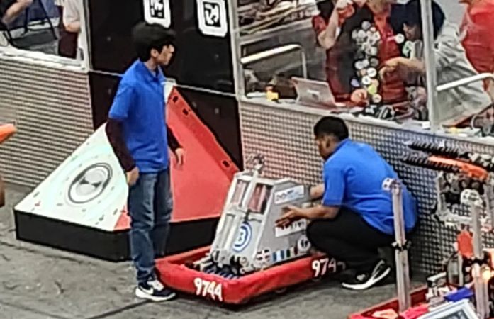  Robotics Team working on a robot