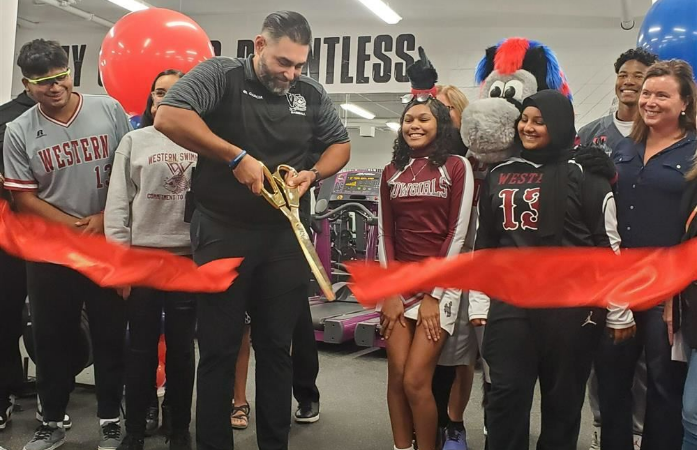  Principal Garcia Cuts Ribbons Western Weight Room