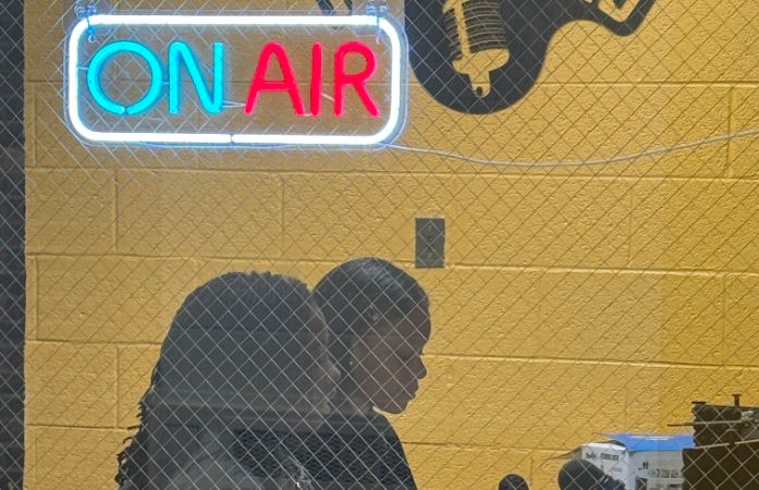  2 girls in podcast studio