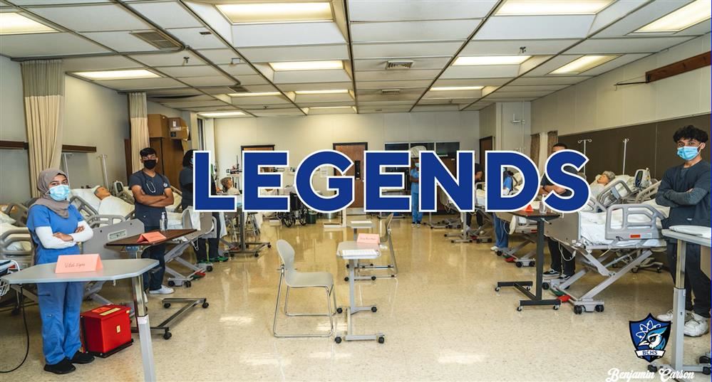  Students in scrubs next to test dummies with the word Legend written over them