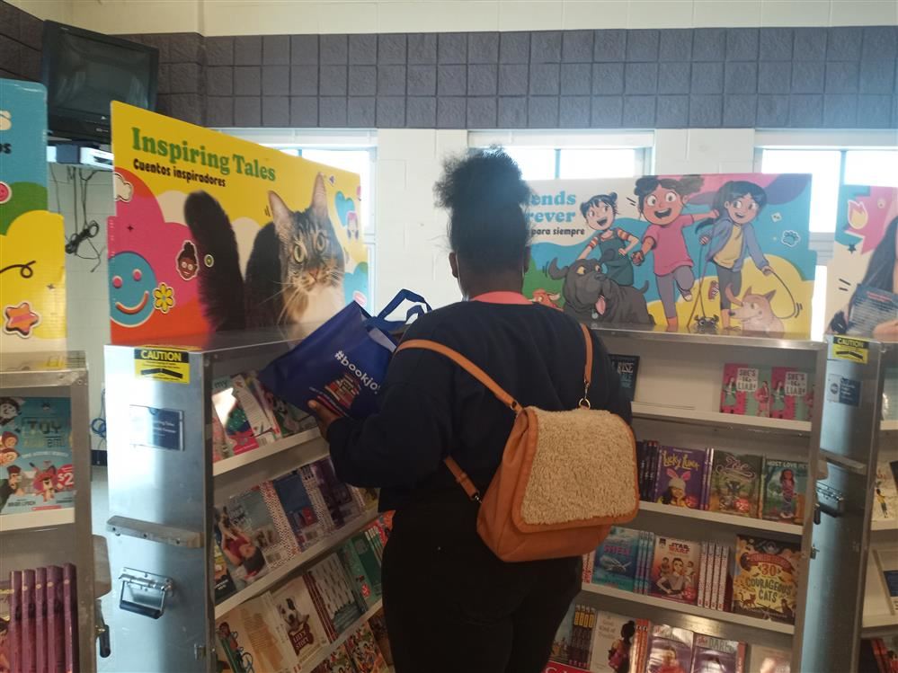  Student selecting a book