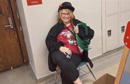Teacher dressed as carrny
