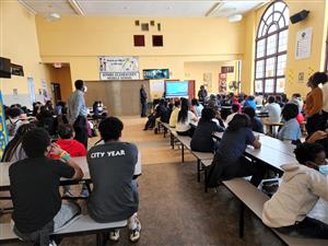 Students listen to speaker