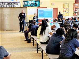 Students listen to speaker