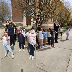 Students looking up at the sky