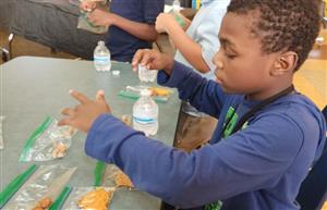  Male students pointing at snacks