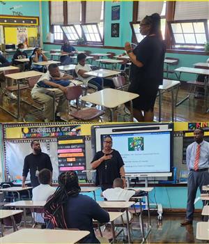 Principal Clayton continue  talking to students