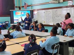 4th Graders listen to a virtual guest reader