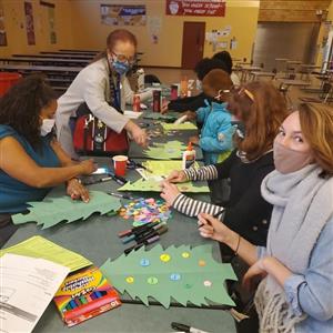 Teachers decorating  the trees