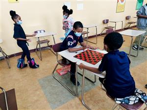 Boys playing games at lunch 1