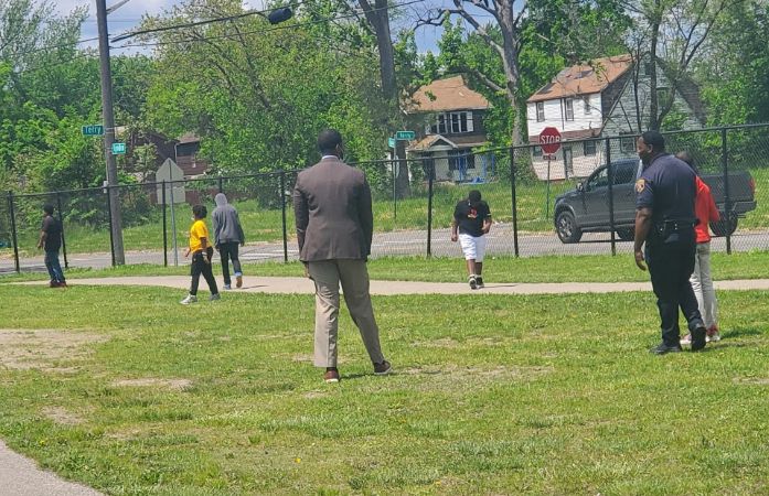 Central Office Staff play football with students