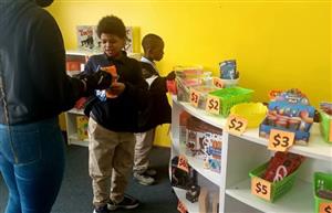  Students spend PAWS bucks
