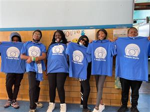 Students pose with YMCA shirts