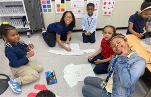 group of students on floor drawing