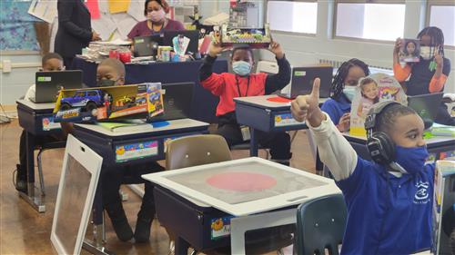 Students with their toys