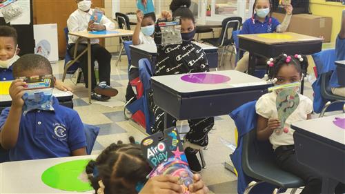 Students with their toys