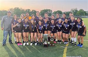 Western girls posing with trophy