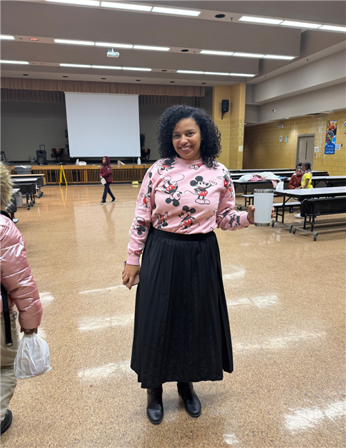woman wearing pink minnie mouse sweater