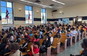  Students sitting in auditorium