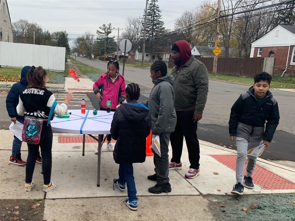 Bottle flip challenge station from the Turkey Trot