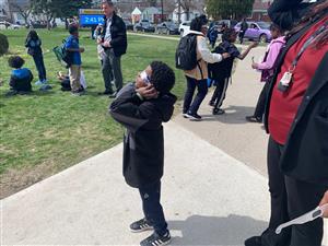 Student viewing the eclipse