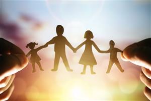 Parents holding their children's hand 