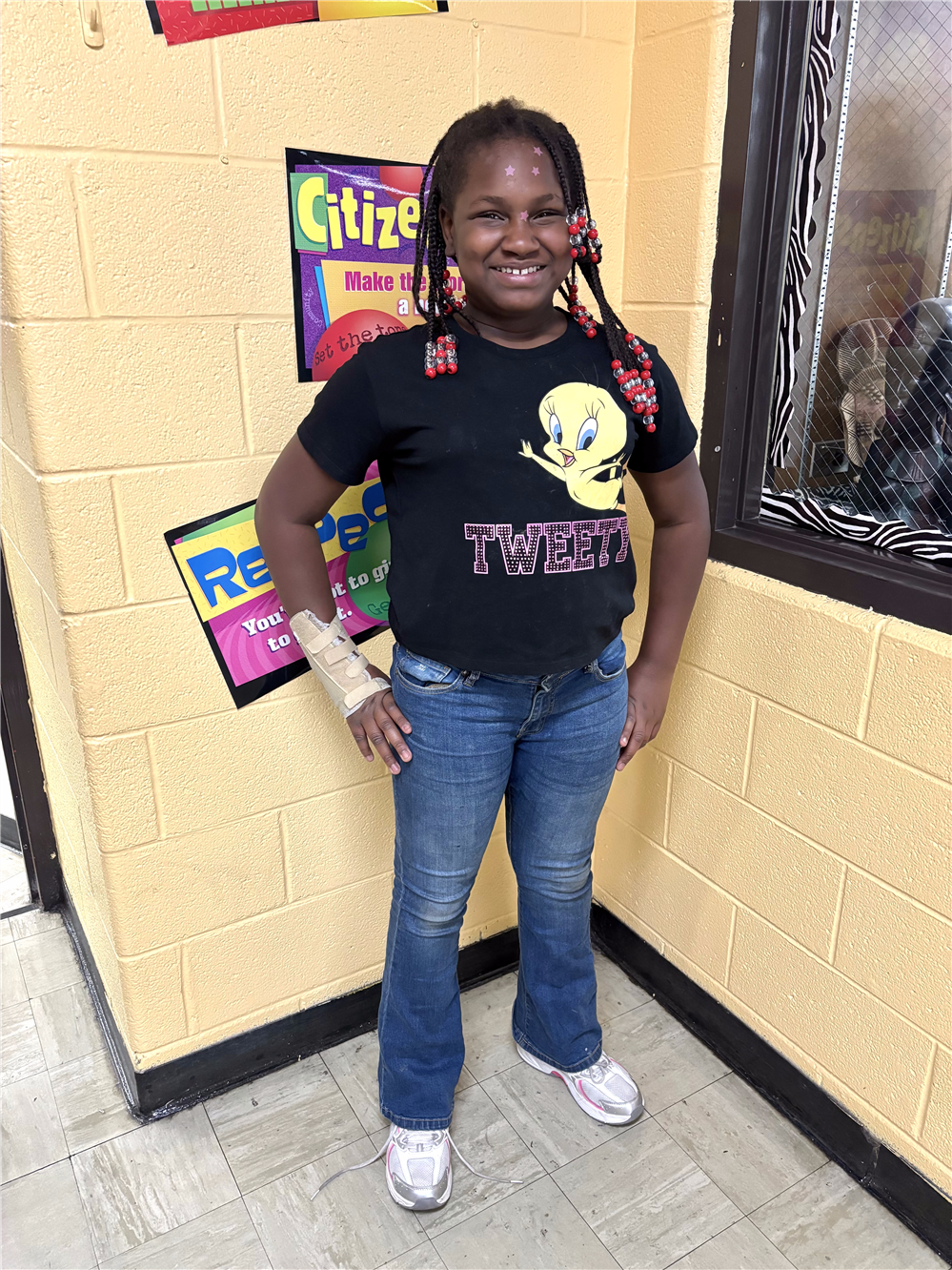  4th Grade girl smiling.