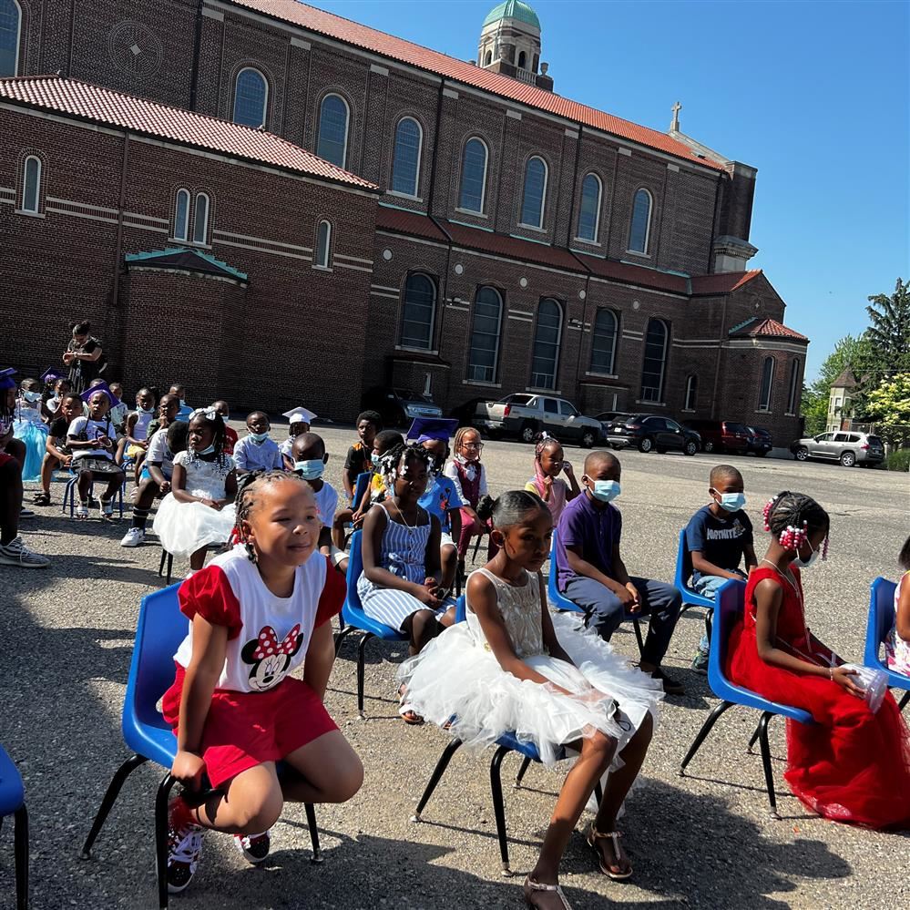  Students in chairs outdoors