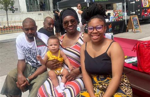  The student with her family at the celebration