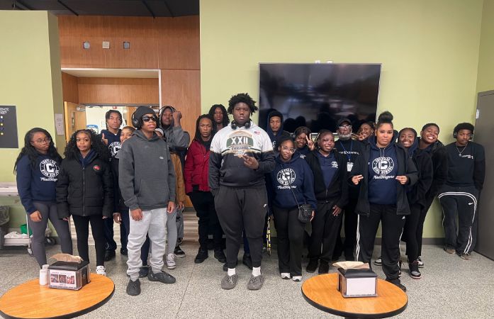  Students standing in the Madonna University dining area