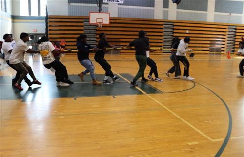 Students pulling a rope
